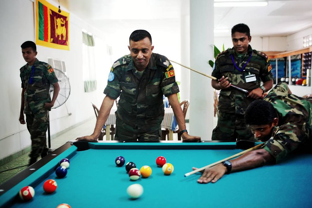 Sri Lankan soldiers working for the UN relax in Haiti in 2008. I was told this gig was a reward for them. It offered bet