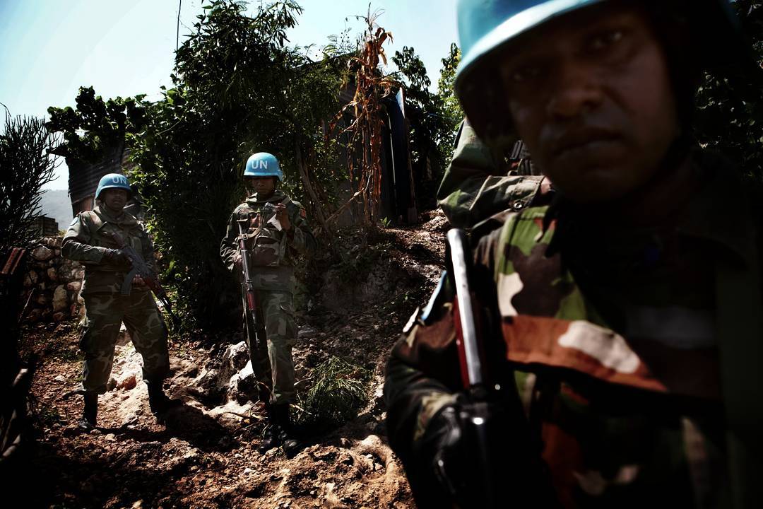 Sri Lankan soldiers working for the UN patrol in and around Cite Soleil in Port au Prince Haiti in 2008. I think this wa