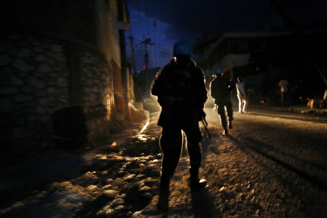 A Sri Lankan soldier working for the UN patrols in and around Cite Soleil in Port au Prince Haiti in 2008. Photo 21of 22