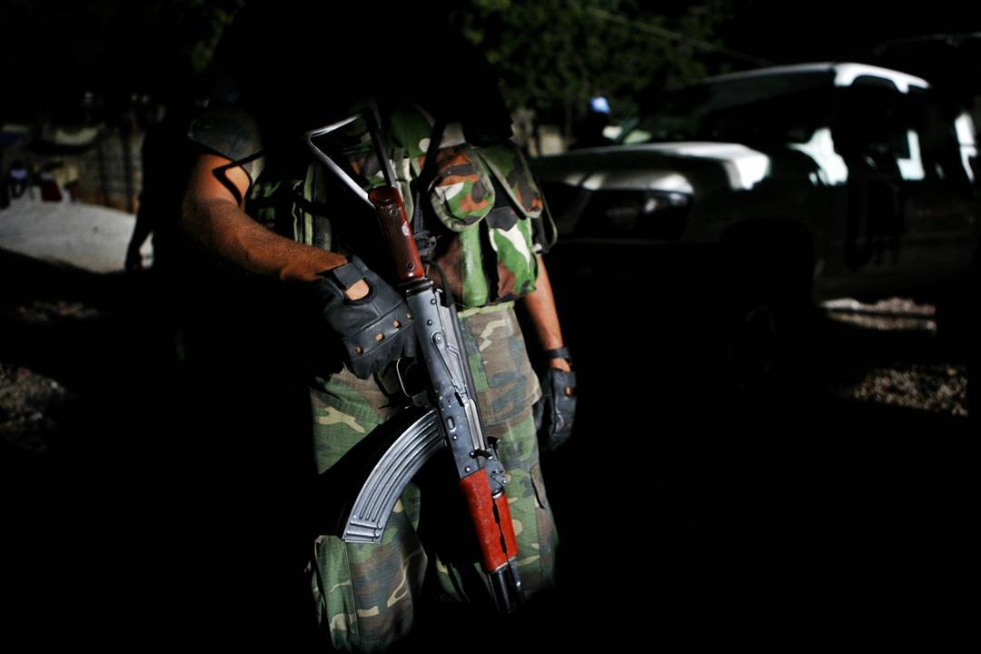 A Sri Lankan soldier working for the UN patrols in and around Cite Soleil in Port au Prince Haiti in 2008. Photo 22 of 2